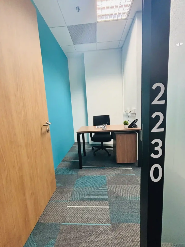 Private 1 pax office in Singapore with desk, chair, and natural lighting, ideal for solo professionals and EP holders
