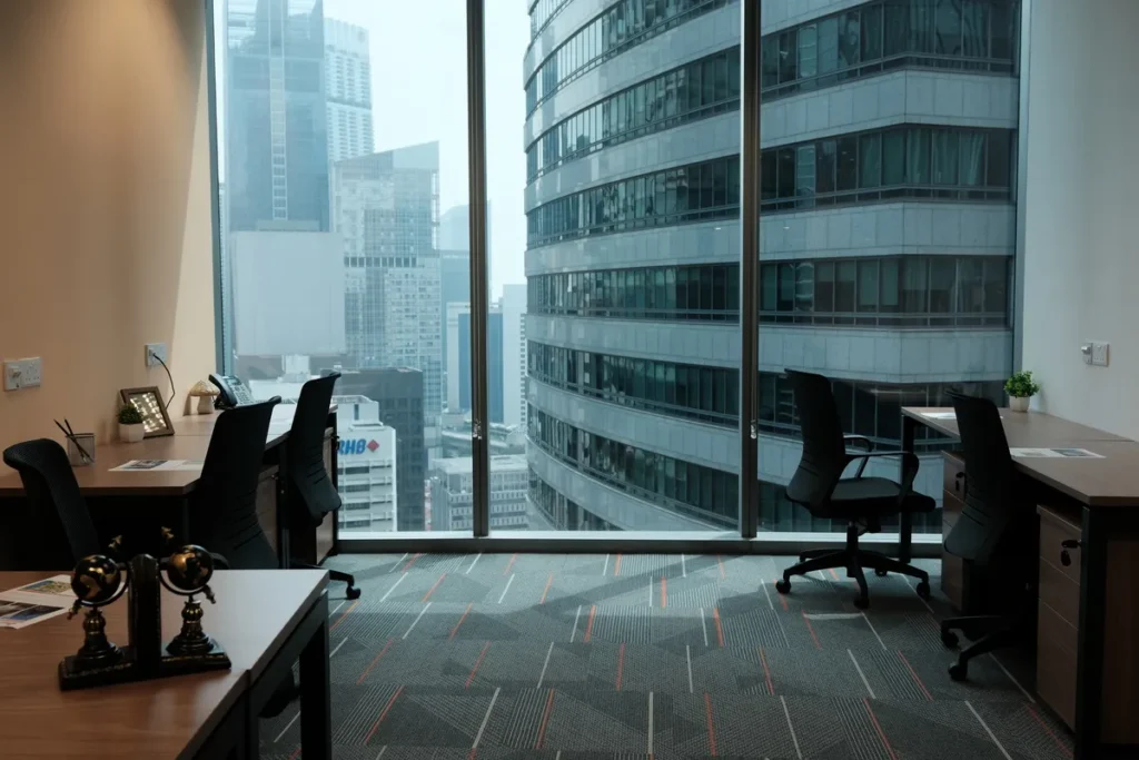 Private real office space in Singapore with floor-to-ceiling windows and natural light